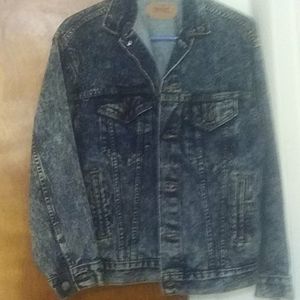 Levi jacket don't know how old 4 pockets .